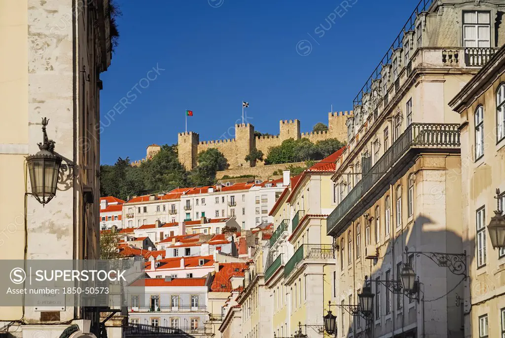 Portugal, Estremadura, Lisbon, Praco do Fiqueira with Castle de Sao Jorge in the background.