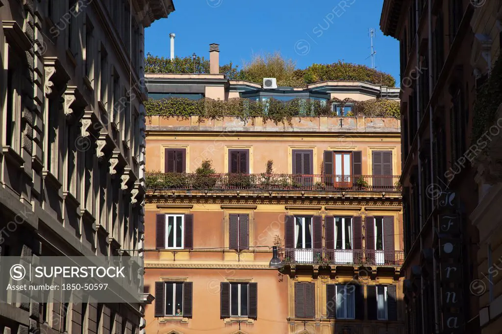 Italy, Lazio, Rome, Typical architecture with shuttered windows.