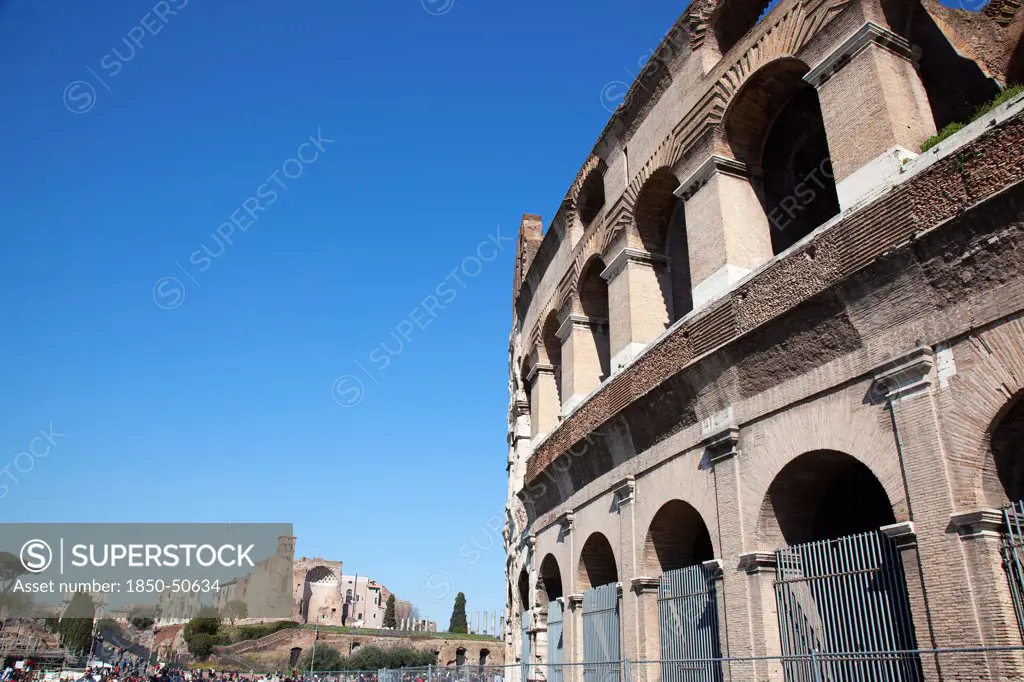 Italy, Lazio, Rome, View of the the ancient Roman Coliseum ruins.