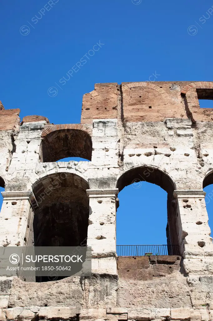 Italy, Lazio, Rome, View of the the ancient Roman Coliseum ruins.
