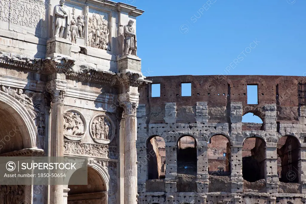 Italy, Lazio, Rome, The Arch of Constantine with the Coliseum behind.