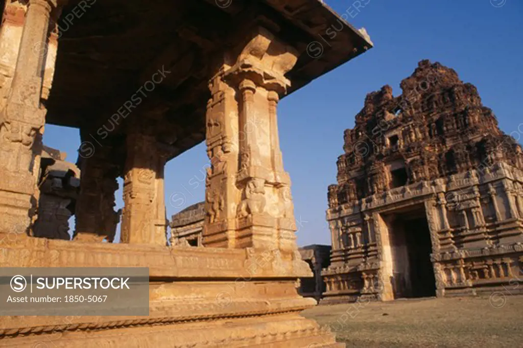 India, Karnataka, Hampi, Ruins Of Vijayanagar Ancient Capital.  Partial View Of The Exterior Of Achyutaraya Temple