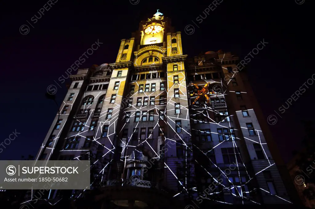 England, Merseyside, Liverpool, Royal Liver Building 100th anniversary constructed in 1911 celebrated by staging a 3D Macula light show with the theme Spider on Spiders Web.