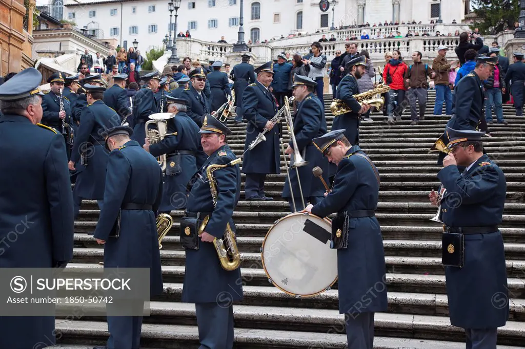 Italy, Lazio, Rome, Military Brass band playing on the Spanish Steps during Sunday.