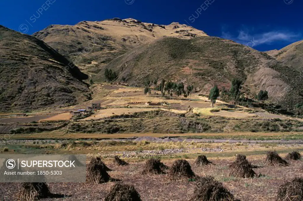 Peru, Puno Administrative Department, La Raya, 'View From The Train On The Altiplano At La Raya.  Agricultural Land In The Foreground, Mountains Beyond.  '