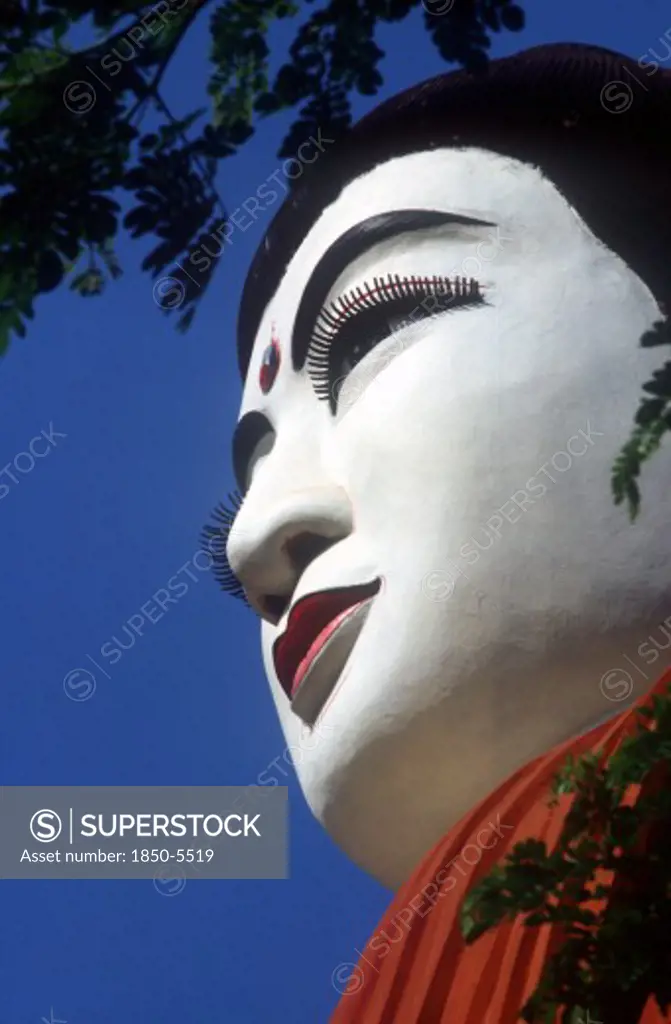 Myanmar, Pegu, 'Detail Of White Face Of Buddha Statue In Threequarter Profile Left, Viewed From Below.'