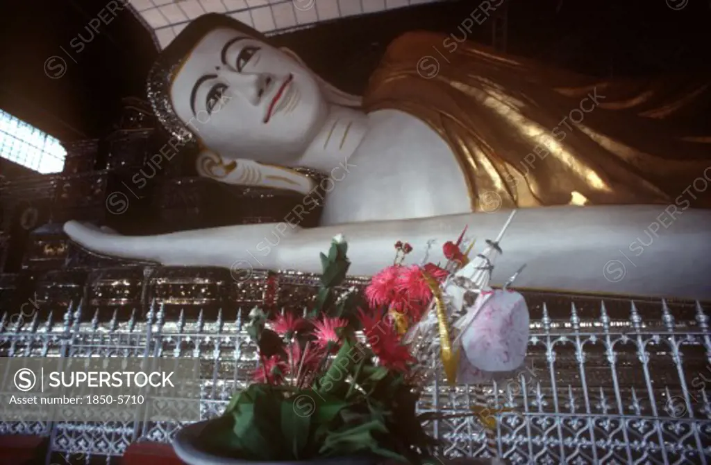 Myanmar, Pegu, Shwethalyaung Reclining Buddha.  Part View Of Head And Arm.