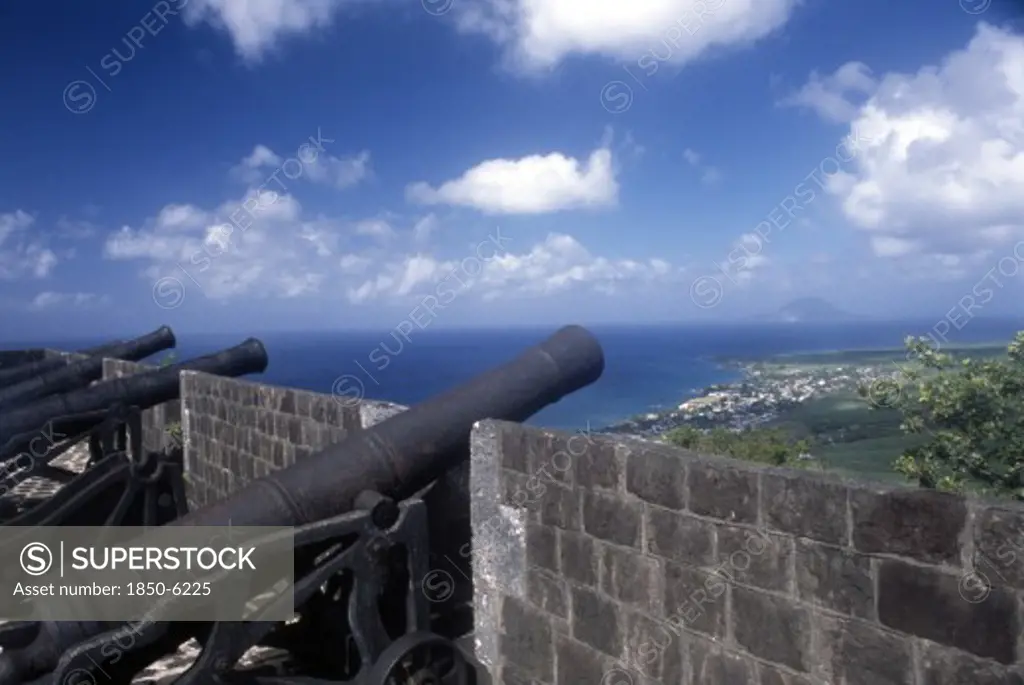West Indies, St Kitts, Brimstone Hill Fort, View Of Coastline From The Top Of The Fortified Wall With Line Of Cannons.