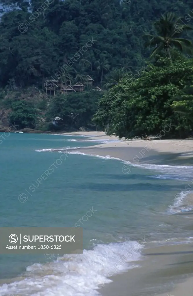 Thailand, Trat Province, Koh Chang, Chalets On A Hillside At The Northern End Of Aow Bai Lan Lonely Beach With Surf Rolling Onto The Beach