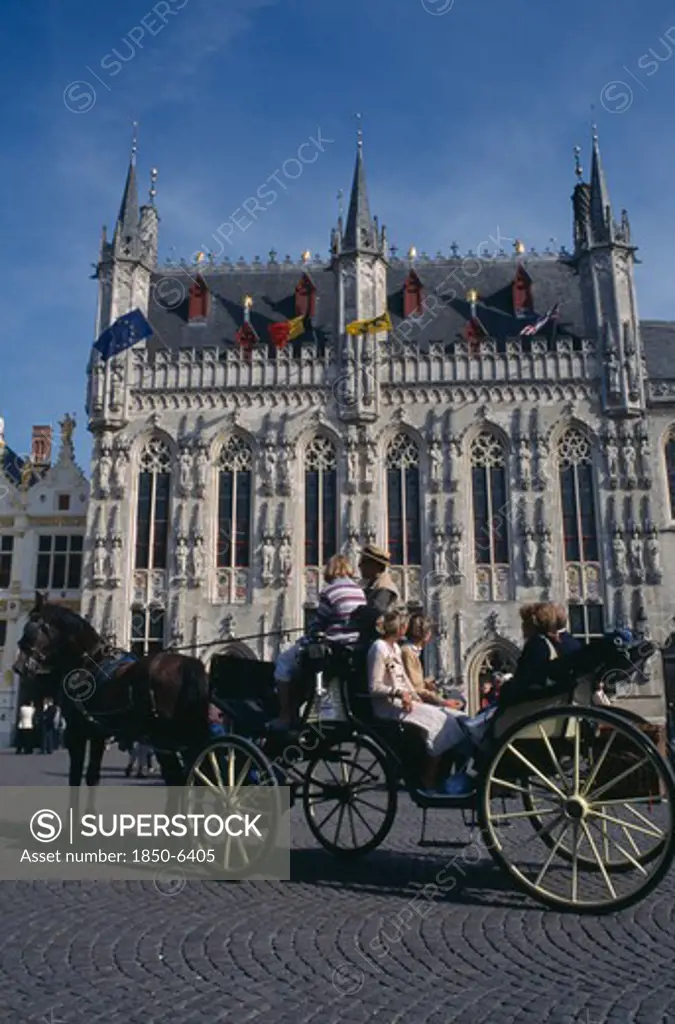 Belgium, West Flanders, Bruges, Tourist Horse And Carriage Outside The Stadhuis In Burg Square