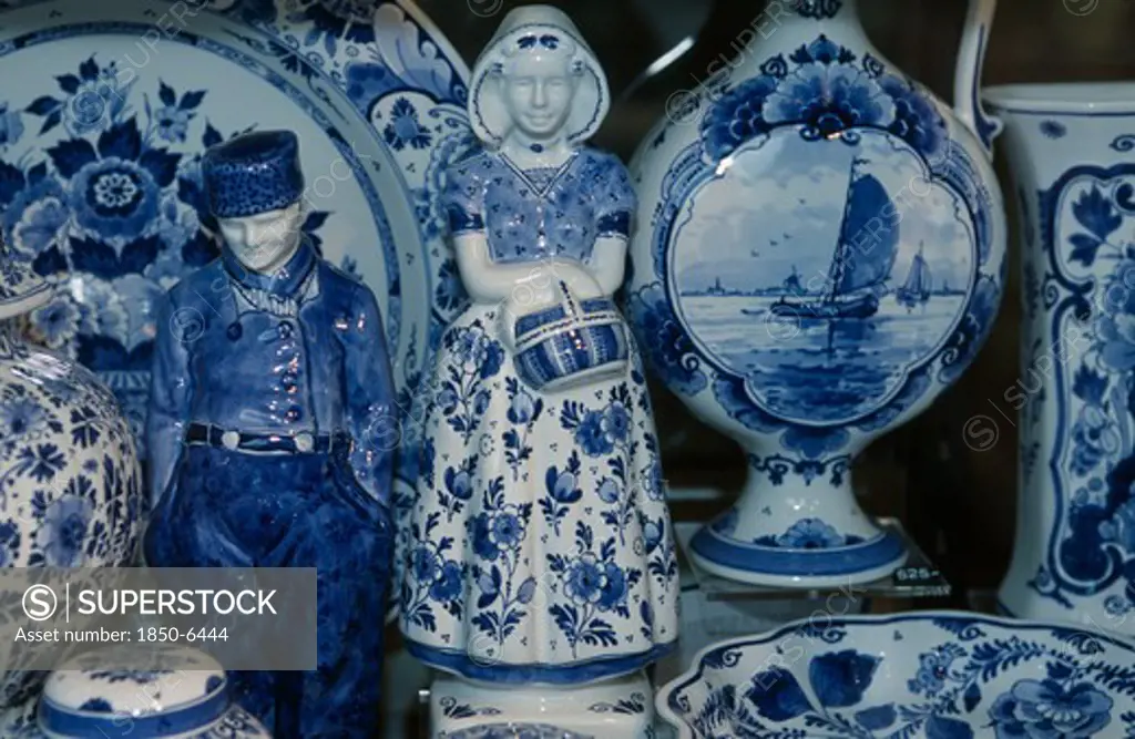 Holland, Zuid Holland, Delft, Close Up View Of A Display Of Delftware In A Shop Called De Porceleyne Fles.