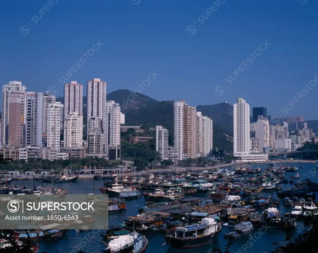 Hong Kong, Aberdeen Typhoon Harbour, View Over The Busy Harbour Toward The City Skyline Beyond