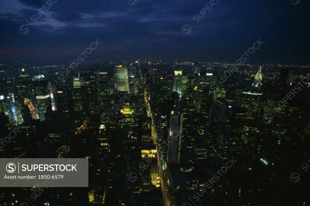 Usa, New York , New York City, View Over Mid Manhattan And The Chrysler Building Illuminated At Night