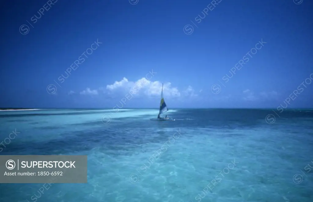 Cuba, Ciego De Avila, Cayo Guillermo, Small Catamaran Boat In Shallow Waters