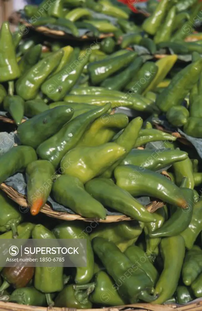 Mexico, Oaxaca, Oaxaca City, Close View Of Green Chillies Displayed At Market.