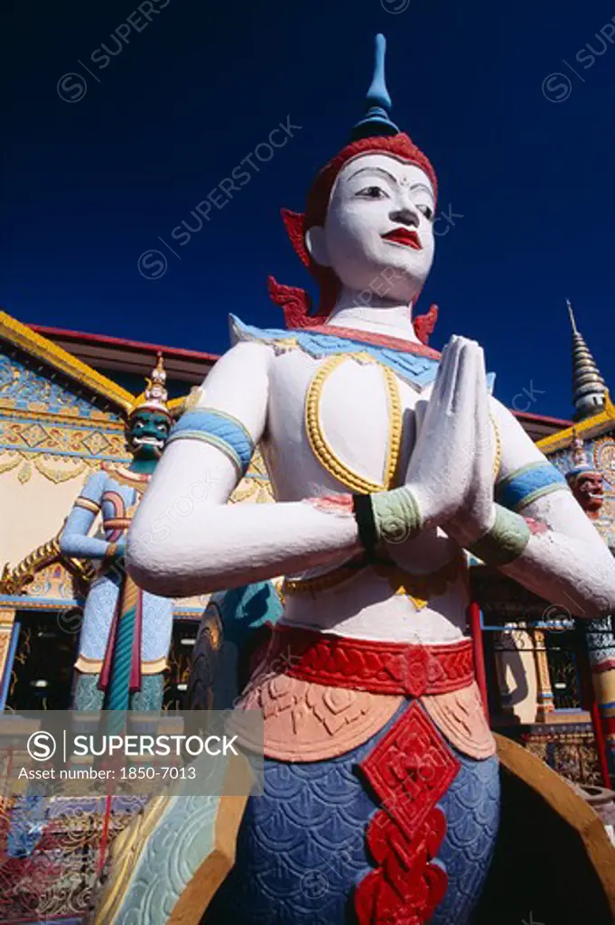 Malaysia, Penang, Georgetown, 'Wat Chayamangkalaram.  Exterior, Temple Statues.'
