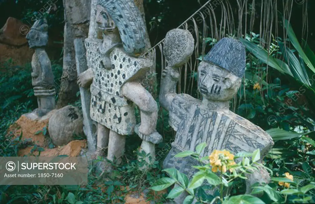 Nigeria, Oshogbo, Oshun Shrine Carvings Showing Hunters And Priests