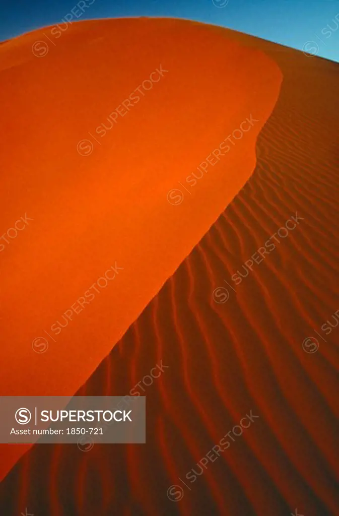 Libya, Sahara Desert, Archan, Slip Face Edge Of Red Sand Dune In The South West