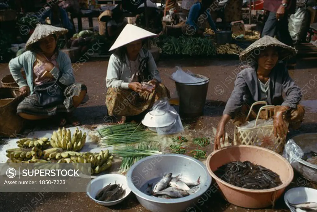 Laos, Vientiane, 'Female Vendors At Market Stall Selling Onions, Chillies, Bananas And Fish.'