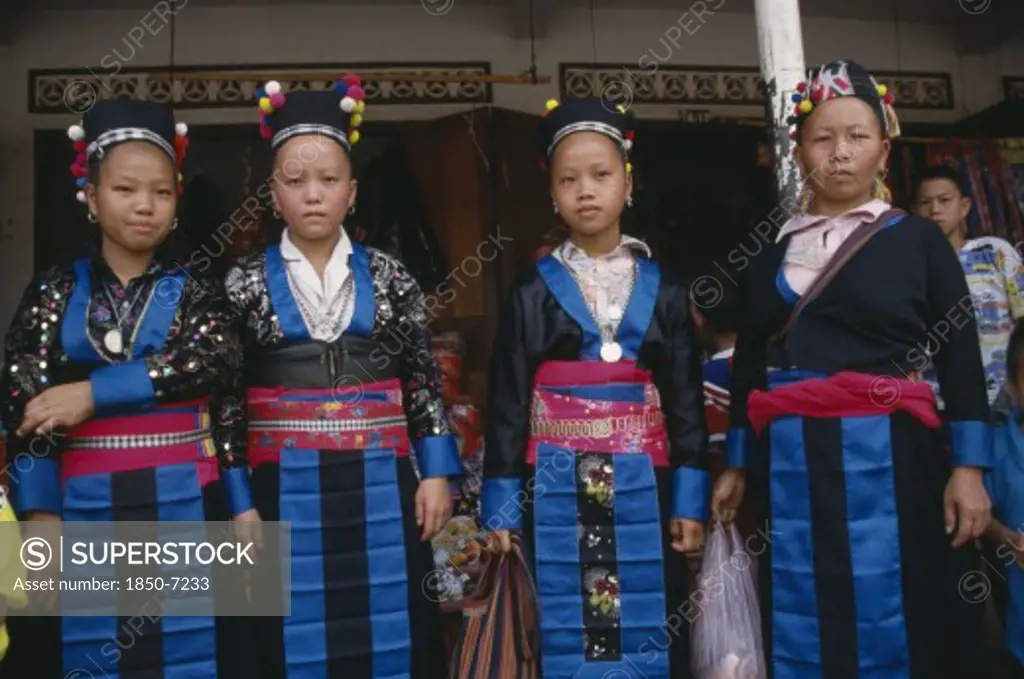 Laos, Luang Prabang, Four Hmong Women In Traditional Dress
