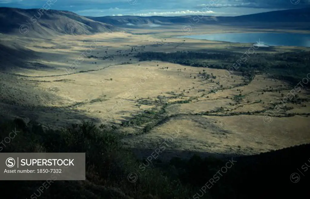 Tanzania, Ngorongoro Crater , View From The Rim Of Volcanic Crater Across Valley Floor And Lake Magadi.