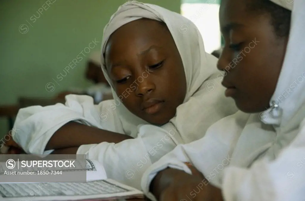 Nigeria, Kano, Primary School Children Reading A Book