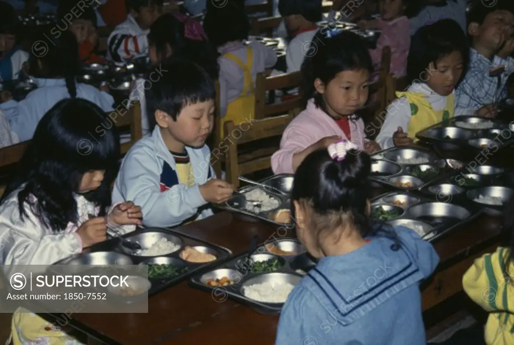 South Korea, Mokpo, Nursery School Pupils Eating Lunch.