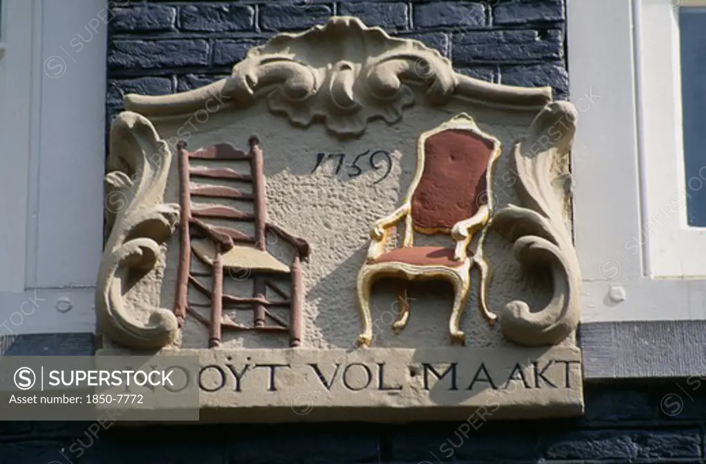 Holland, Noord, Amsterdam, Close Up Detail Of A Wall Tablet Used Before House Numbers Were Added
