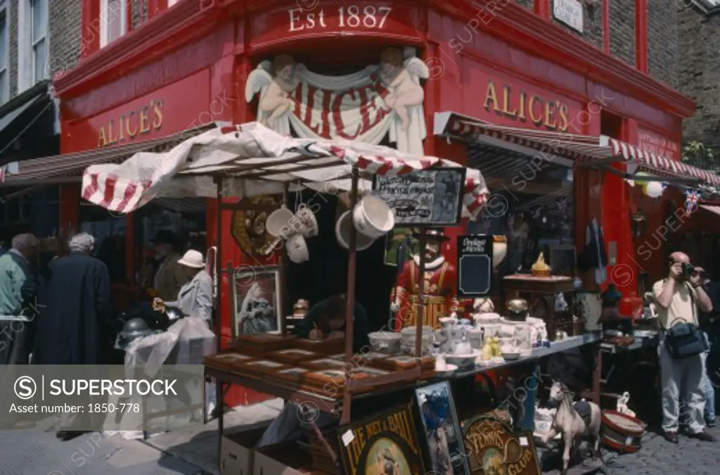 England, London, Portobello Road Antique Shop In The Market With A Stall Outside On The Pavement