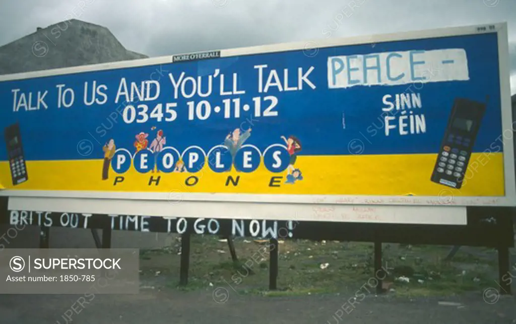 Ireland,  North , Belfast, 'Peoples Phone Billboard Advertisment Poster On Falls Road Dawbed With Sinn Fein Grafitti, Belfast'