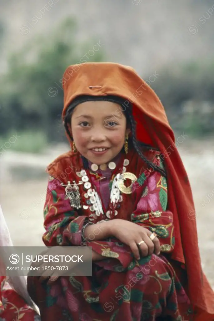 Afghanistan, Children, Portrait Of Kirghiz Girl In Traditional Dress.