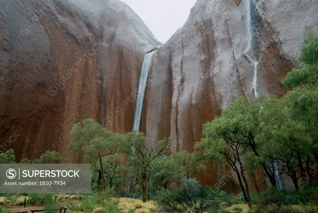 Australia, Northern Territories, Uluru, Ayers Rock.  Waterfalls At Maggie Springs Or Mutidjula Caused By Rainstorm.