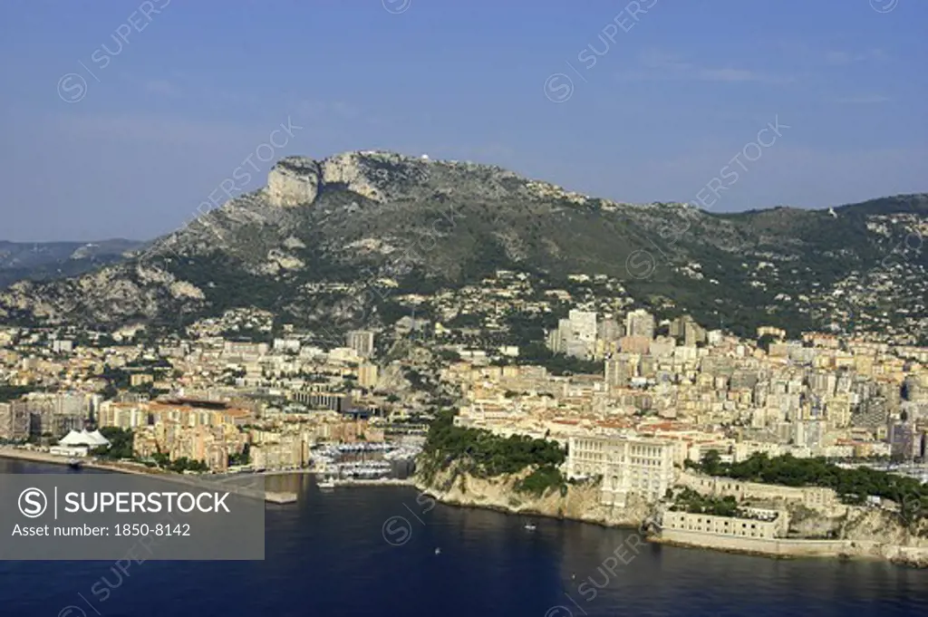 Monaco, Cote D Azur, Monte Carlo, Aerial View From The Sea Toward The Coastal City And Coastline