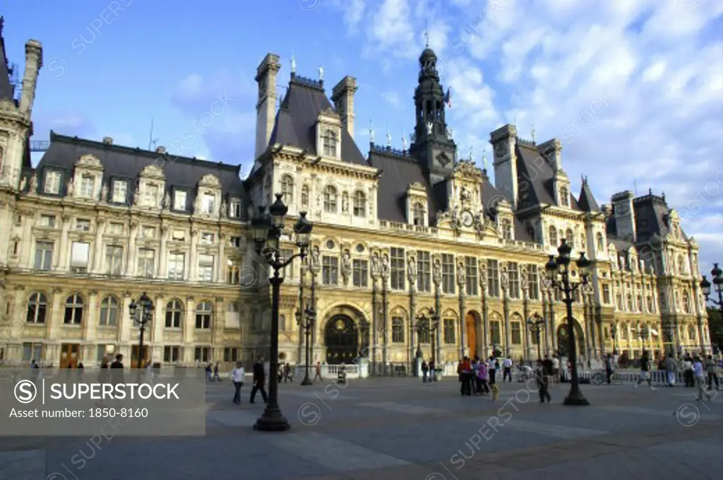 France, Ile De France, Paris, Hotel De Ville With Elaborate Turrets And Stonework Overlooking A Pedestrianized Square
