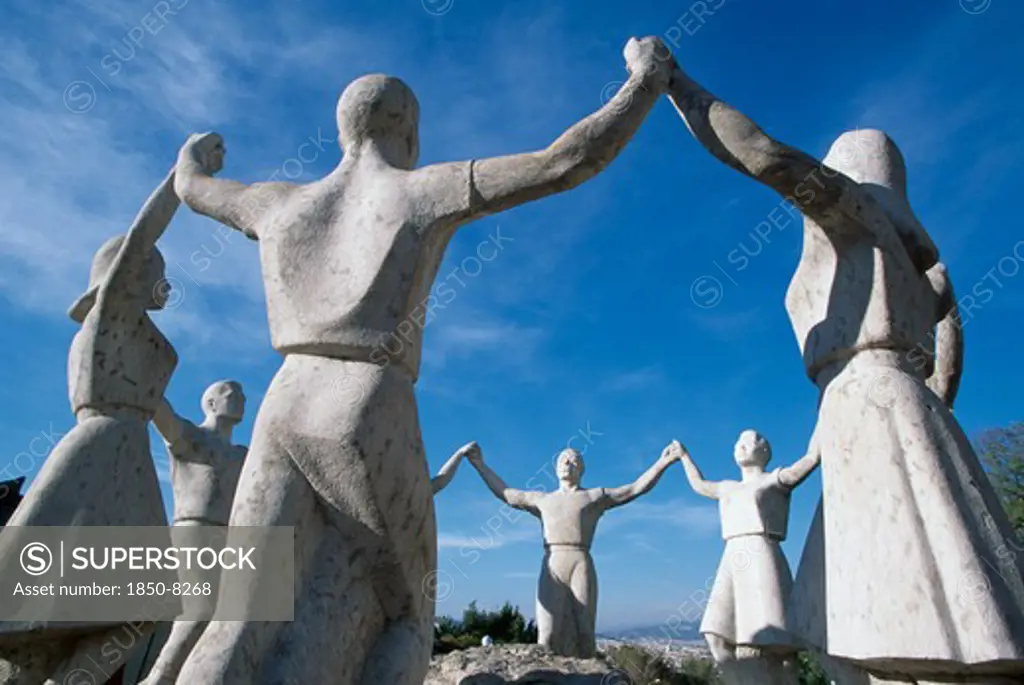 Spain, Catalonia, Barcelona, Cropped View Of Monument To Sardana Dance.