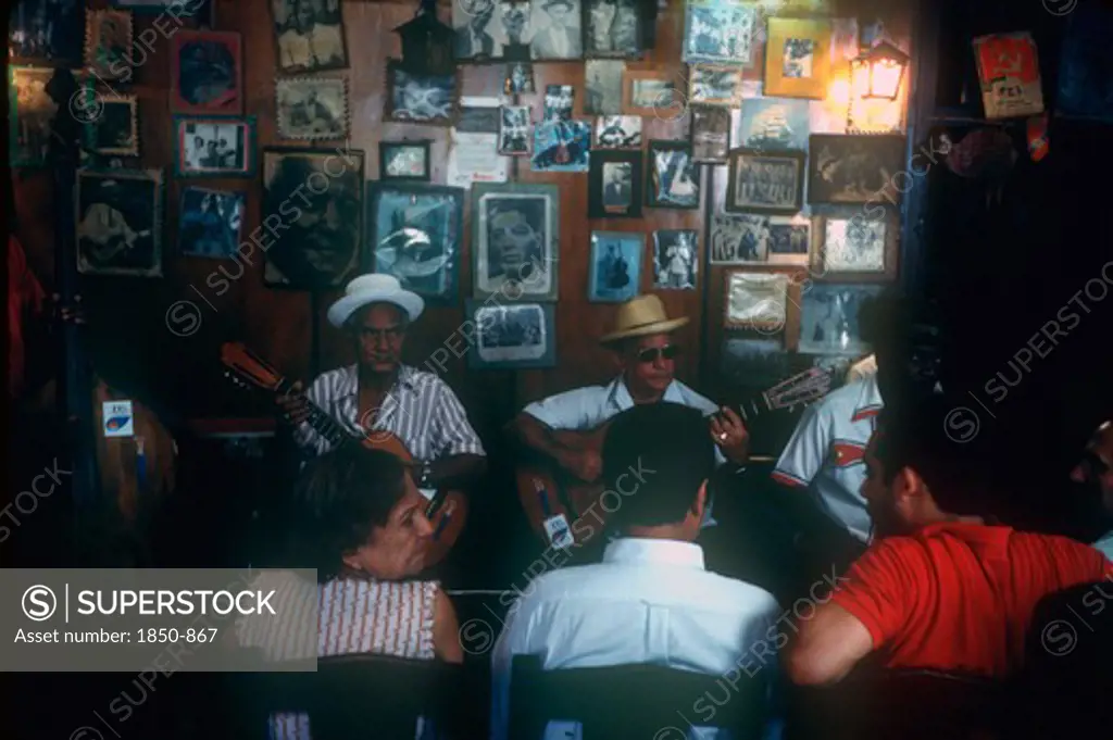 Cuba, Santiago, Troubadors Home.  Interior And Musicians.