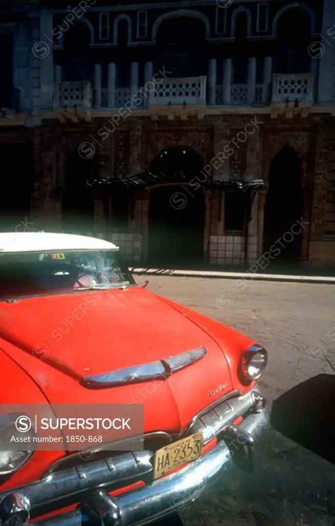 Cuba, Havana, Detail Of Red Us Style Car Parked On Old Havana Street.