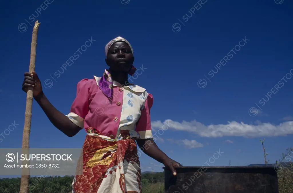Malawi, Lipangwe, Farm Worker On Organic Training Farm Lomadef Making Chicken Manure