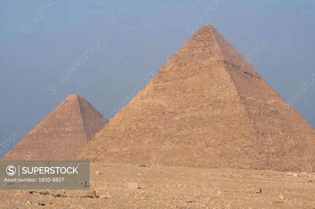 Egypt, Cairo Area, Giza, Great Pyramid Of Cheops Or Khufu Partly Seen Behind Pyramid Of Chephren Also Known As Khafre Or Khephren.