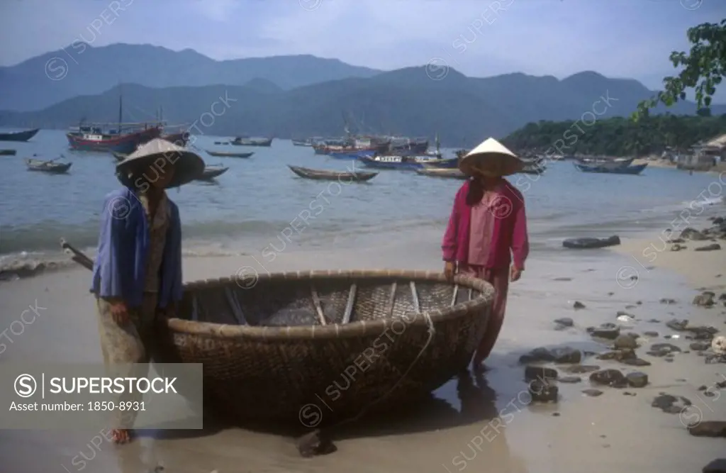 Vietnam, Nha Trang, Mieu Island, Local Women With Traditional Coracle