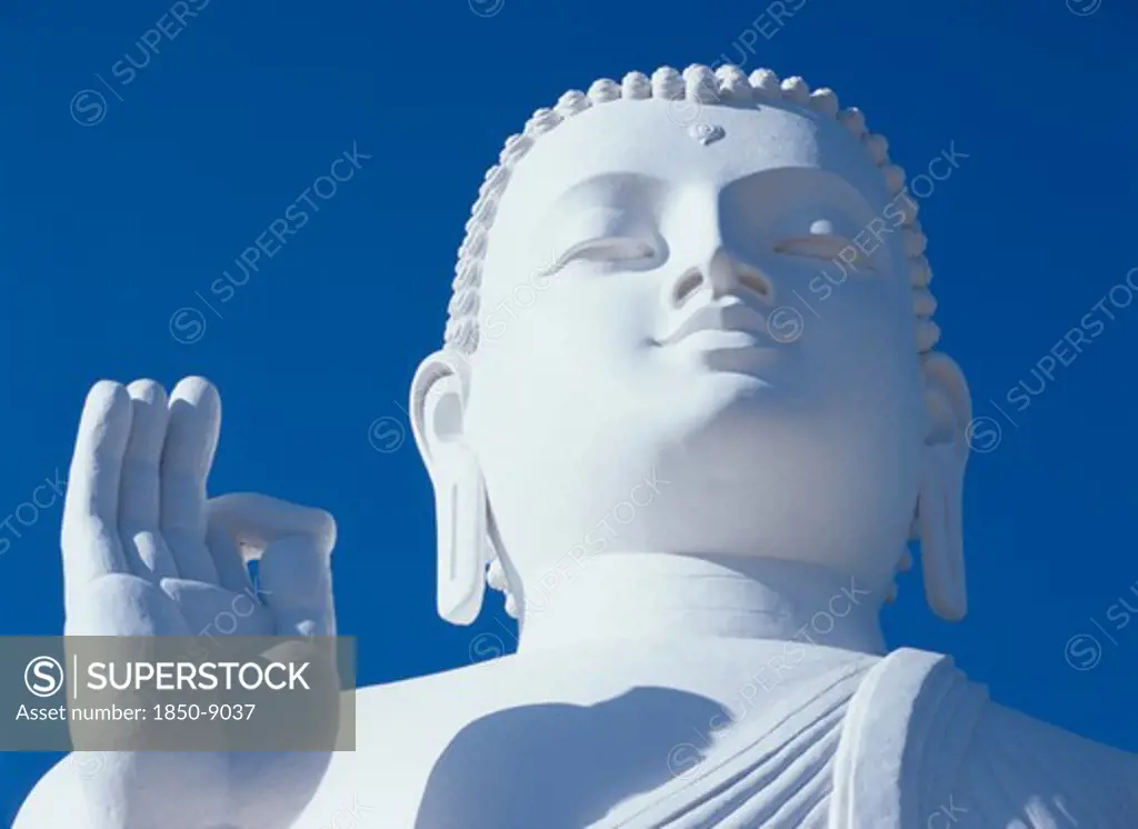 Sri Lanka, Mihintale, Large White Seated Buddha.  Detail Of Head And Raised Hand.