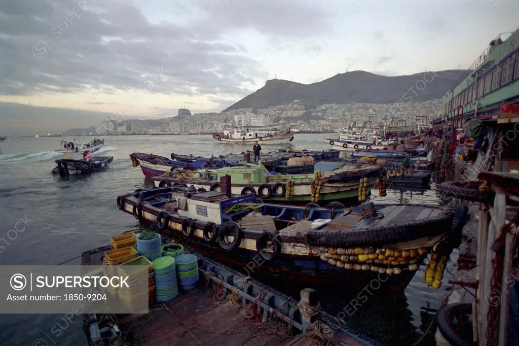 South Korea, Pusan, Central Pusan, Chagalchi Fish Market With Moored Fishing Boats