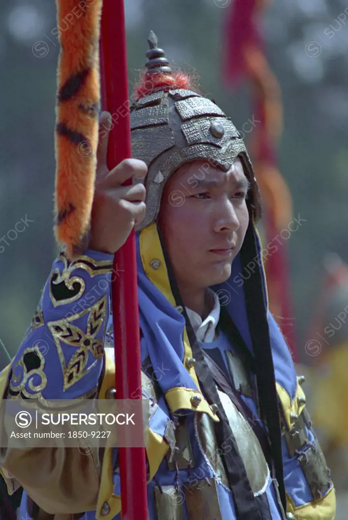 China, Shandong, Jinan, Portrait Of A Guard In Costume At A Reenactment