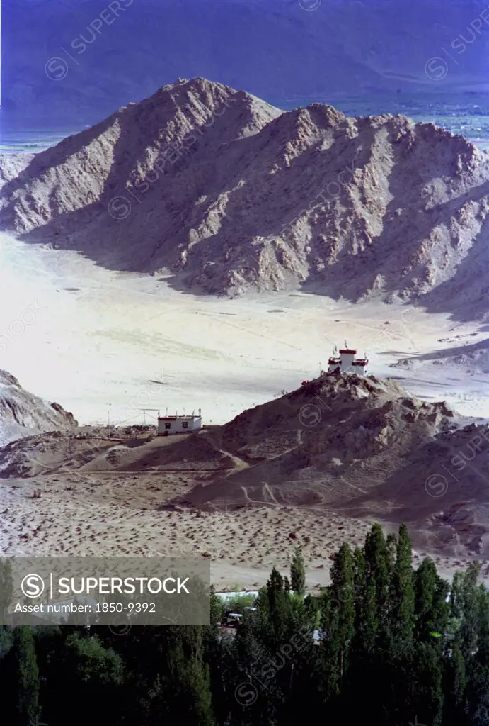 India, Ladakh, Leh, View Toward Distant Temples On The Outskirts Of The Town Against A Backdrop Of Mountains