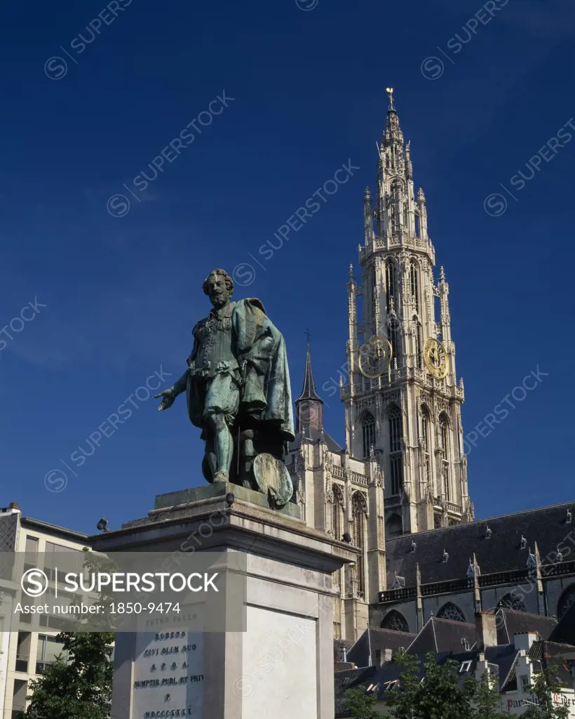 Belgium, Flemish Region, Antwerp, Cathedral Of Notre Dame With Statue Of The Seventeenth Century Artist Peter Paul Rubens In The Foreground