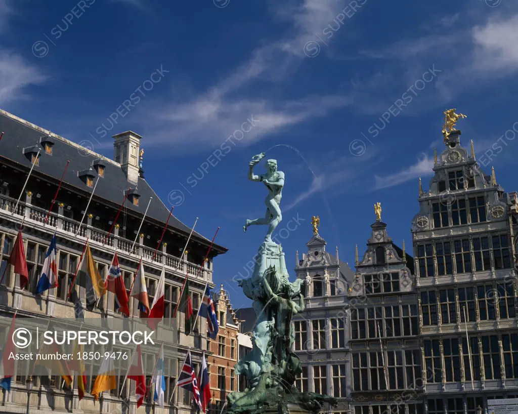 Belgium, Flemish Region, Antwerp, Grote Markt Or Main Square.   The Brabo Fountain Flanked By The Town Hall And Guildhouses.