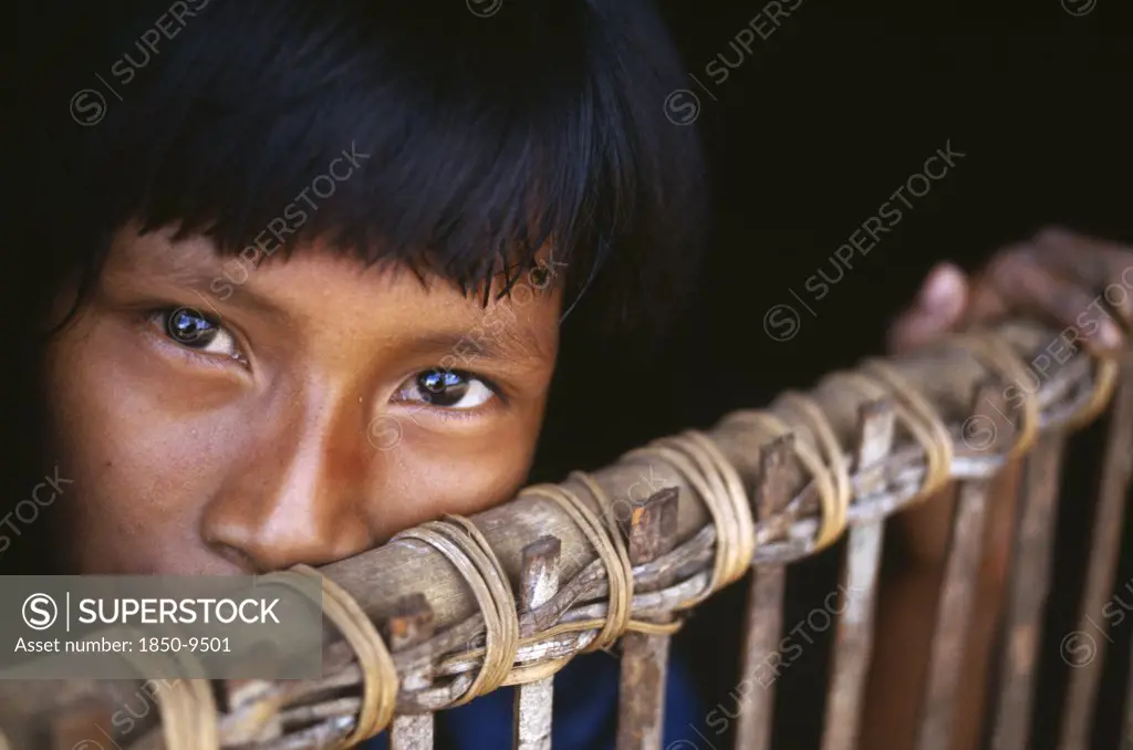 Colombia, Amazonas, Santa Isabel, 'Camilla, A Macuna Indian Girl At The Gate Of Her Maloca. '