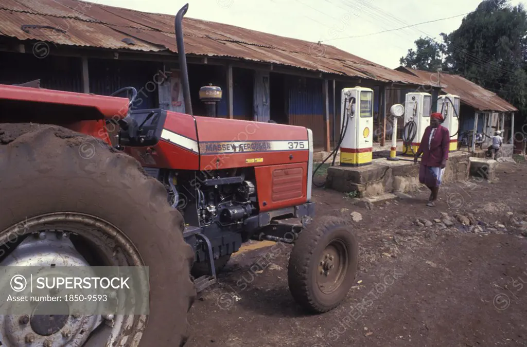 Kenya, Loitokitok, A Tractor At A Petrol Station In The Entirely Maasai Populated Town
