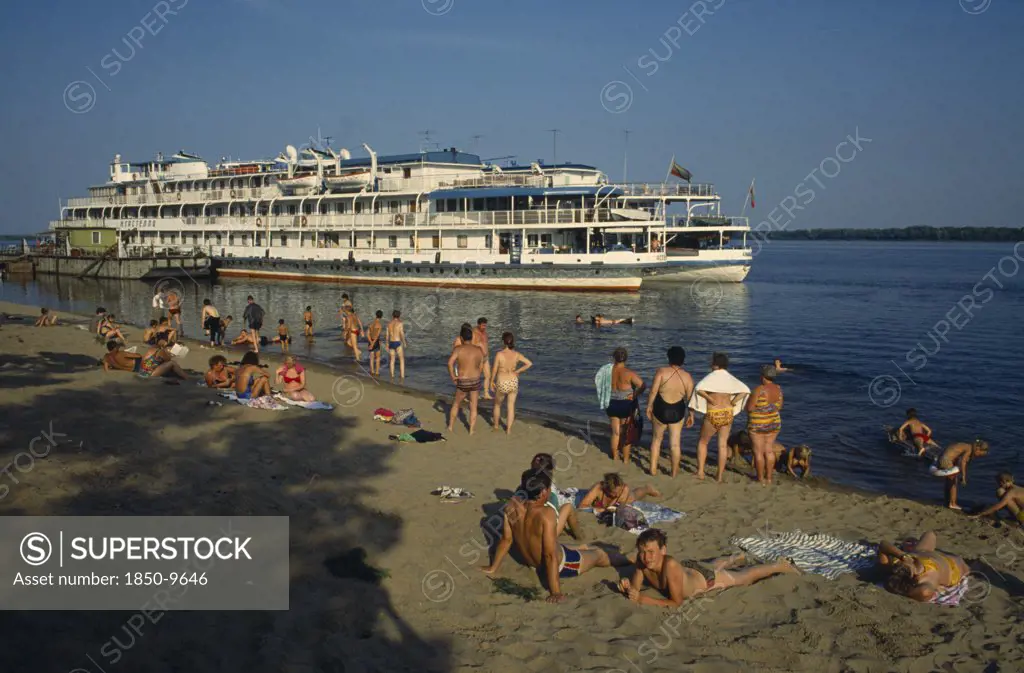 Russia, River Volga, Ferry And Bathers