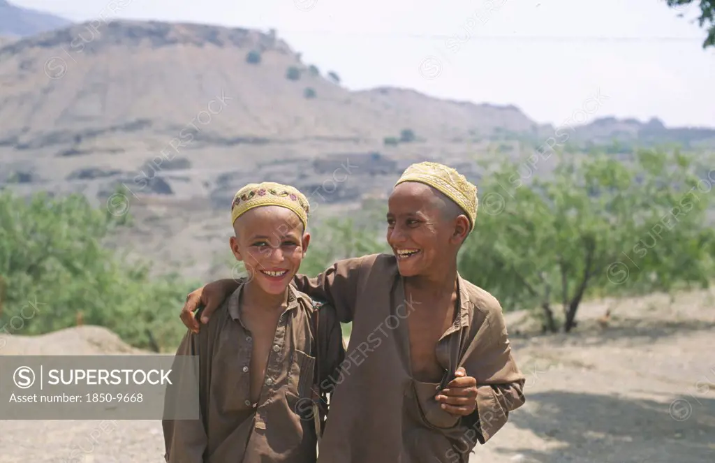 Pakistan, Children, Two Pashtun Boys Near The Afghan Border.